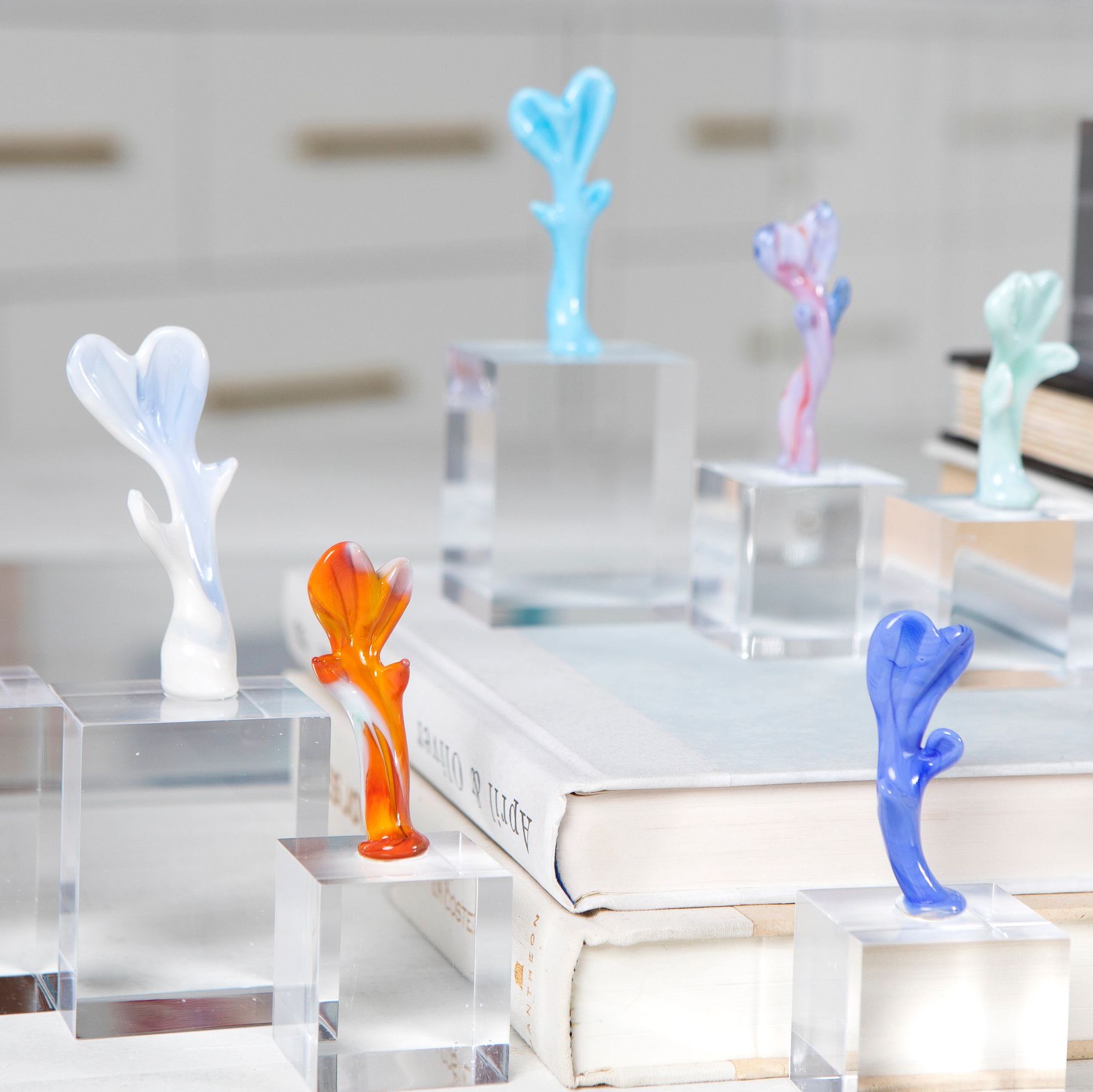 Collection of Hot-Sculpted Murano Glass Lume 'Hug' sculptures on Lucite Bases