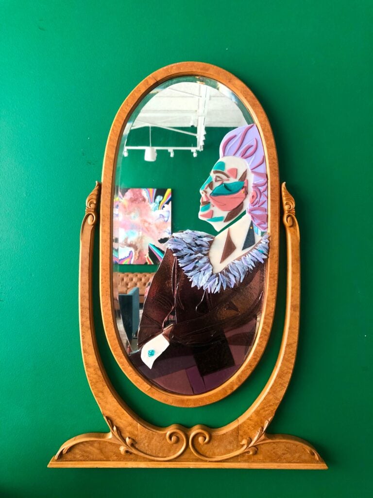 Bespoke glass art vintage mirror with a face on
